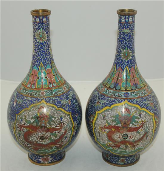 A pair of Chinese cloisonne enamel dragon bottle vases, early 20th century, 25.5cm